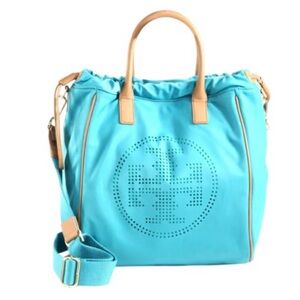 Tory Burch Turquoise Perforated Nylon Drawstring Tote with tan leather trim.